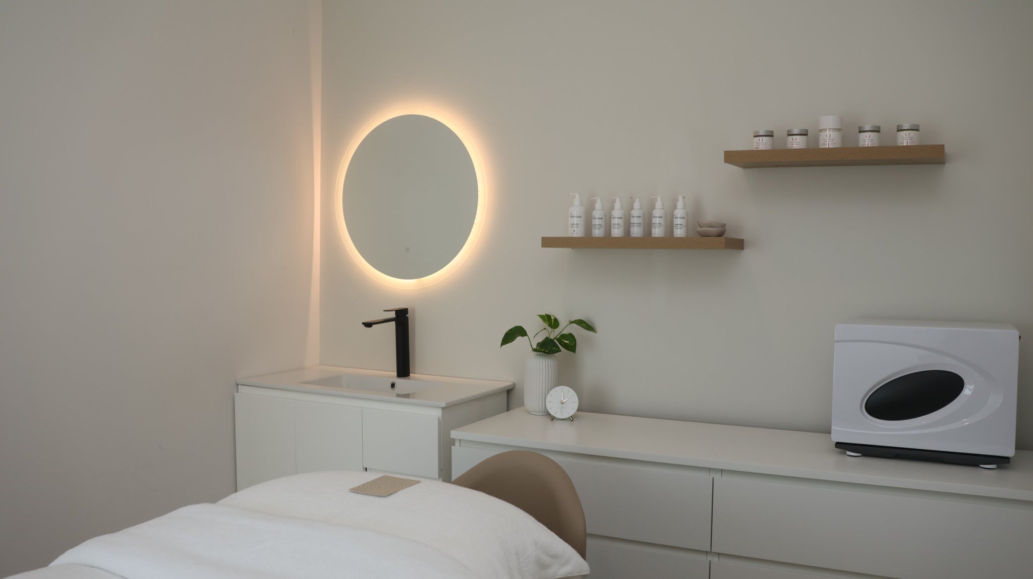 Calming treatment room at The Skin Suite Collective within The Vines Resort, designed for holistic skin treatments that support nervous system relaxation and long-term skin health results in Perth.